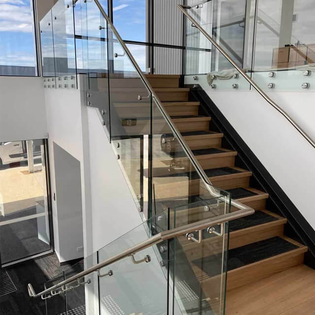 Staircase glass railing
